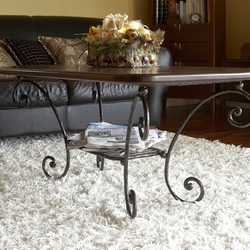 Forged table with a wooden design in the interior of the family house - high quality furniture Forged table with a wooden design in the interior of the family house - high quality furniture