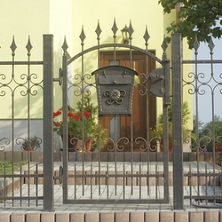 Forged gate with amailbox as apart of afencing of afamily home