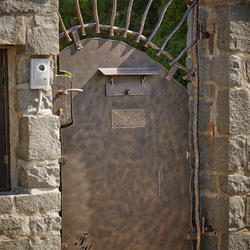 A hand forged gate with sheet metal - A special gate