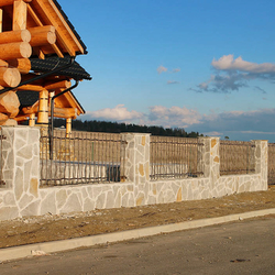 A wrought iron fence Granny - a cottage in the mountains