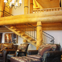 A rustic railing - a cottage in the mountains