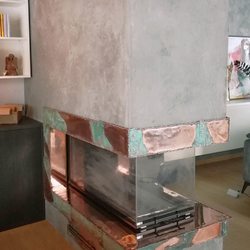 Kamin aus Kupfer in einem Einfamilienhaus Kamin aus Kupfer in einem Einfamilienhaus