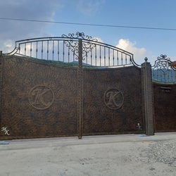 Majestic gate and asmall gate crafted for afamily home near Martin