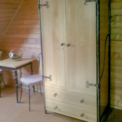 Forged wardrobe with two drawers - furniture designed and crafted for the ari Park pension