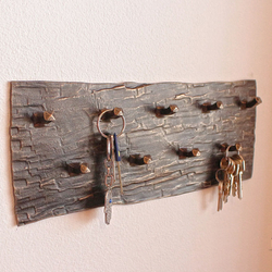 A wrought iron key hanger - wrought iron furniture