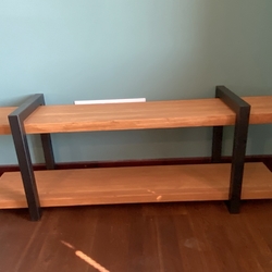 Metal shelves completed with wood in an entrance hall - modern furniture