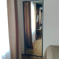 Metal square mirrors in hotel rooms  modern mirrors