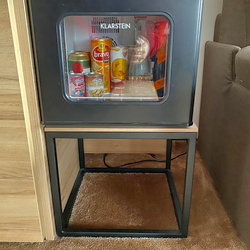 The simple metal table under the fridge  modern hotel furniture