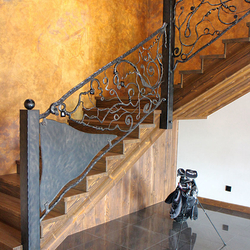 Hand wrought iron interior staircase railing - Roots